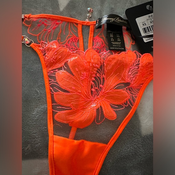 BRITT
ORANGE THONG - Picture 14 of 15